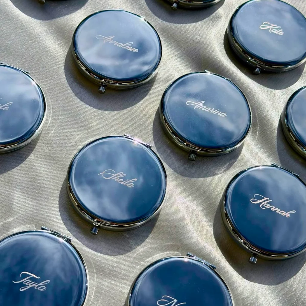Compact pocket mirror with standard and magnifying sides UAE